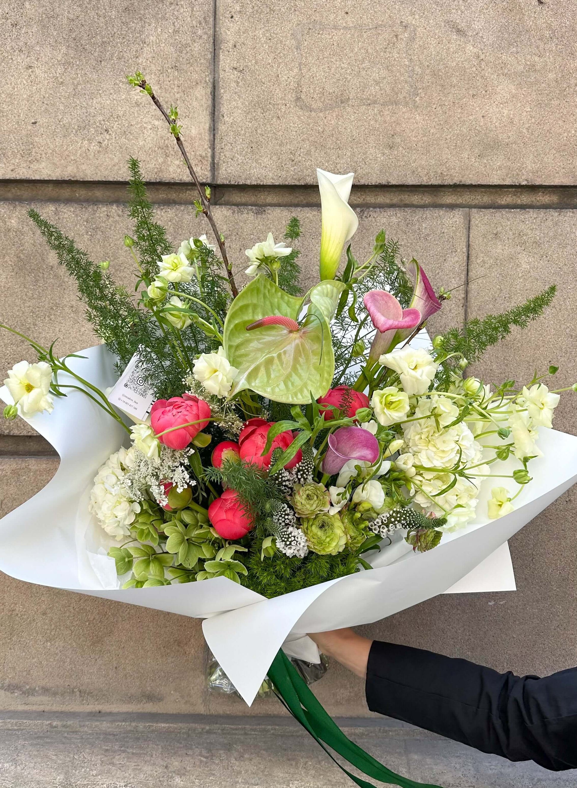 Bouquet of Ranunculus Butterfly, Peony Coral Charm, and Hydrangea by Meadow, available in Barcelona